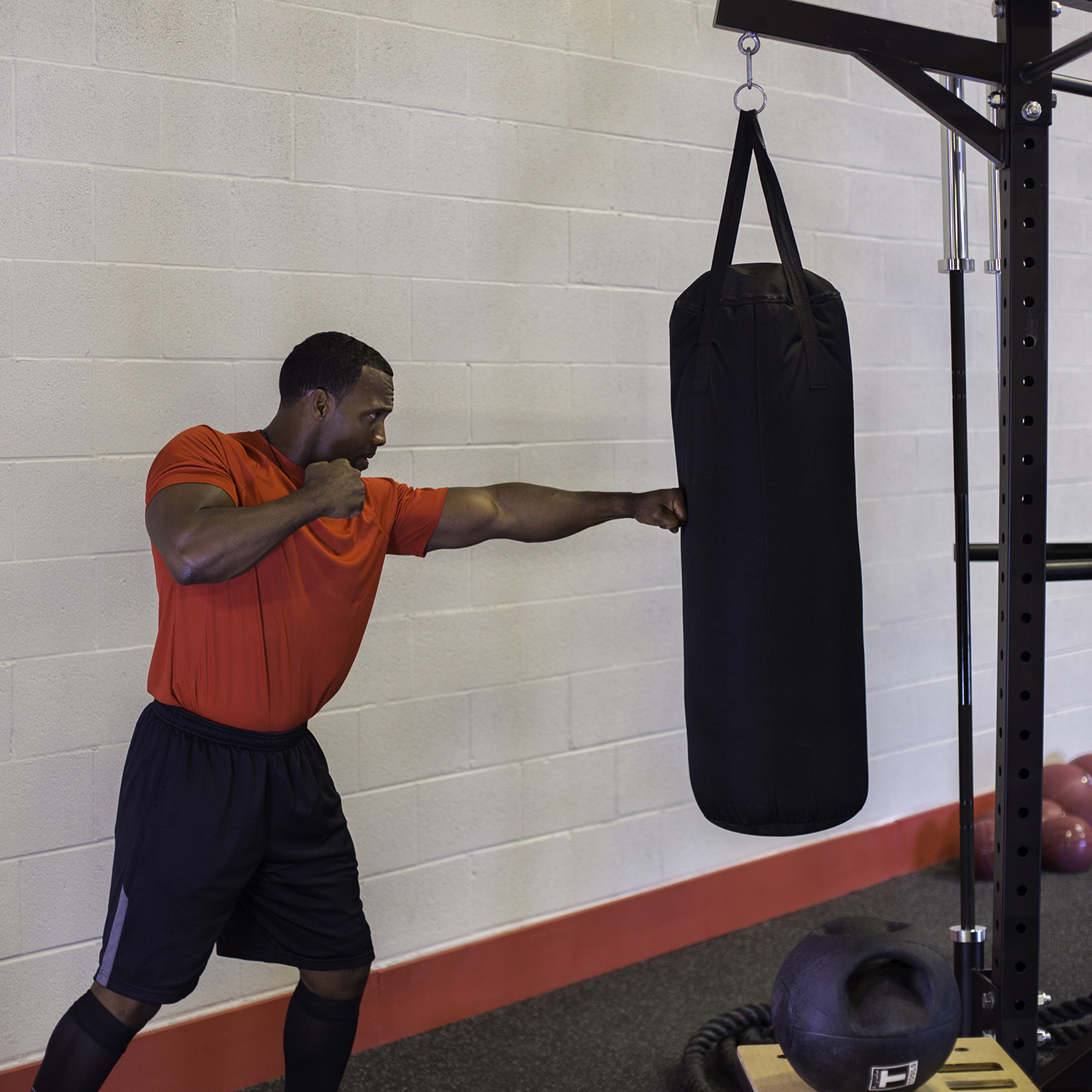 Hanging heavy bag from squat online rack